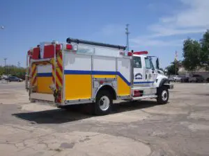 White and yellow Peralta Fire Department Tanker