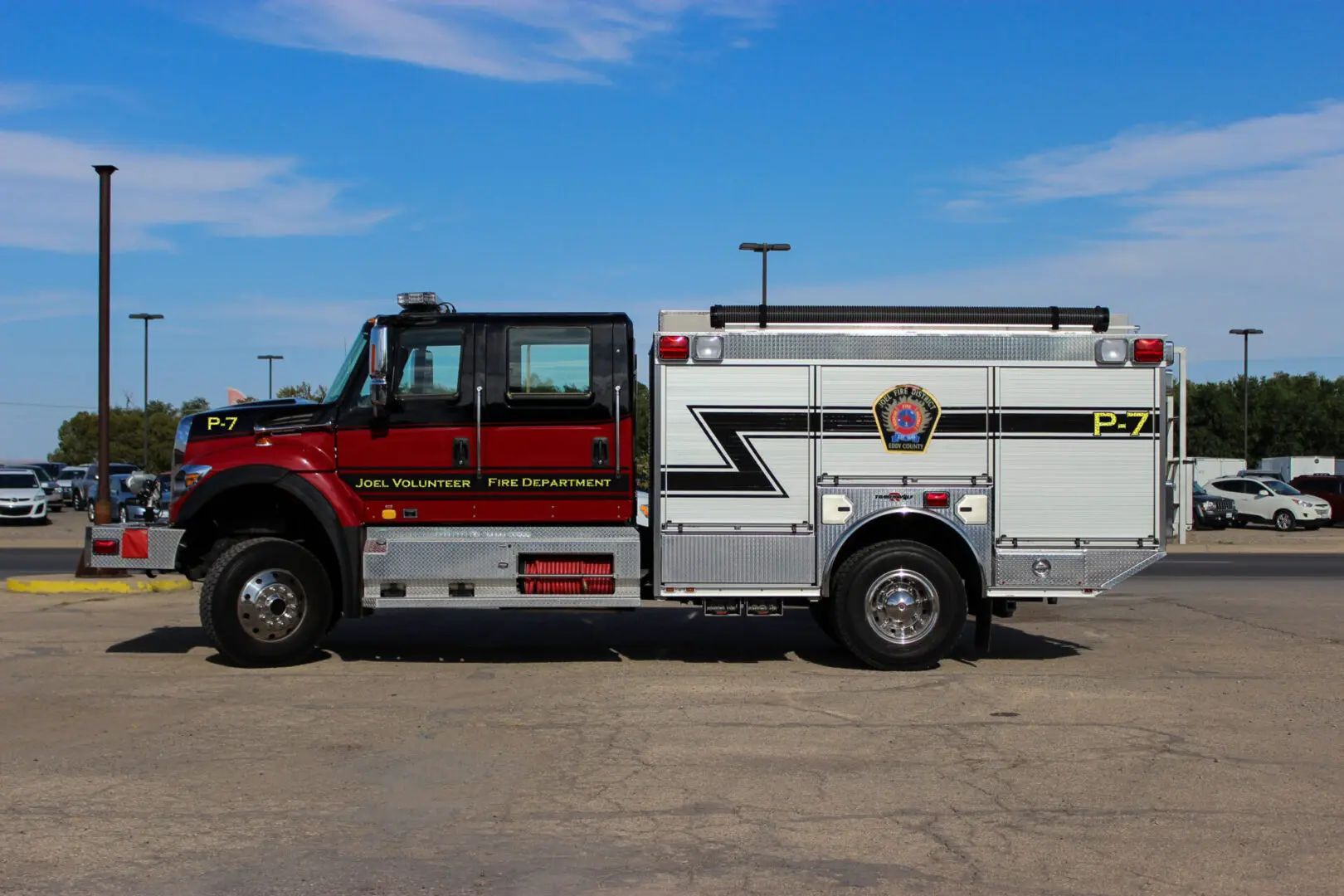 A Fire Engine truck in White and Red Color