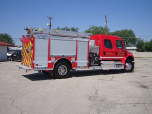 Lincoln County Fire Services Pumper with red and yellow stripes in the back